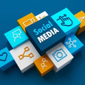 Perspective view of 3D render of SOCIAL MEDIA business concept with symbols on colorful cubes